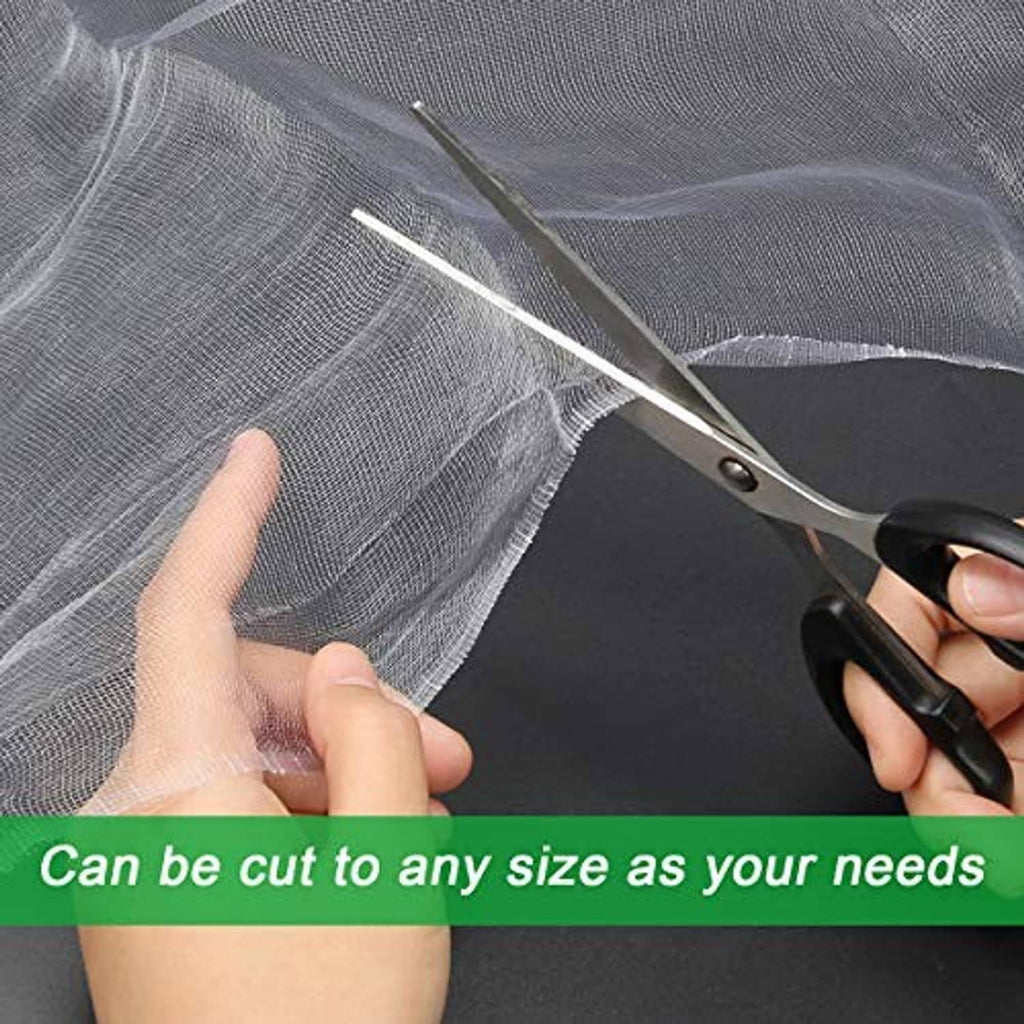 Light gray insect mesh netting being cut to size with scissors