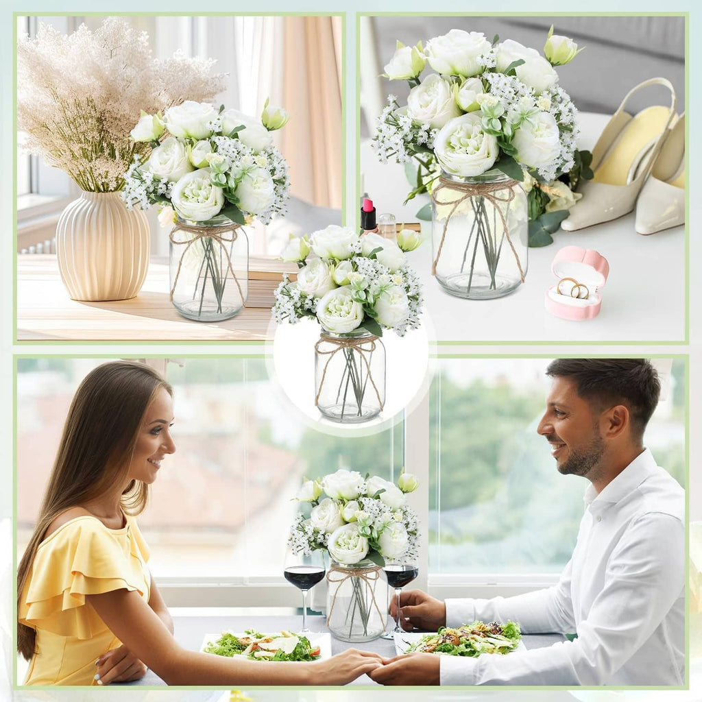 Mason jar centerpiece set with faux white roses, baby breath, and green filler flowers