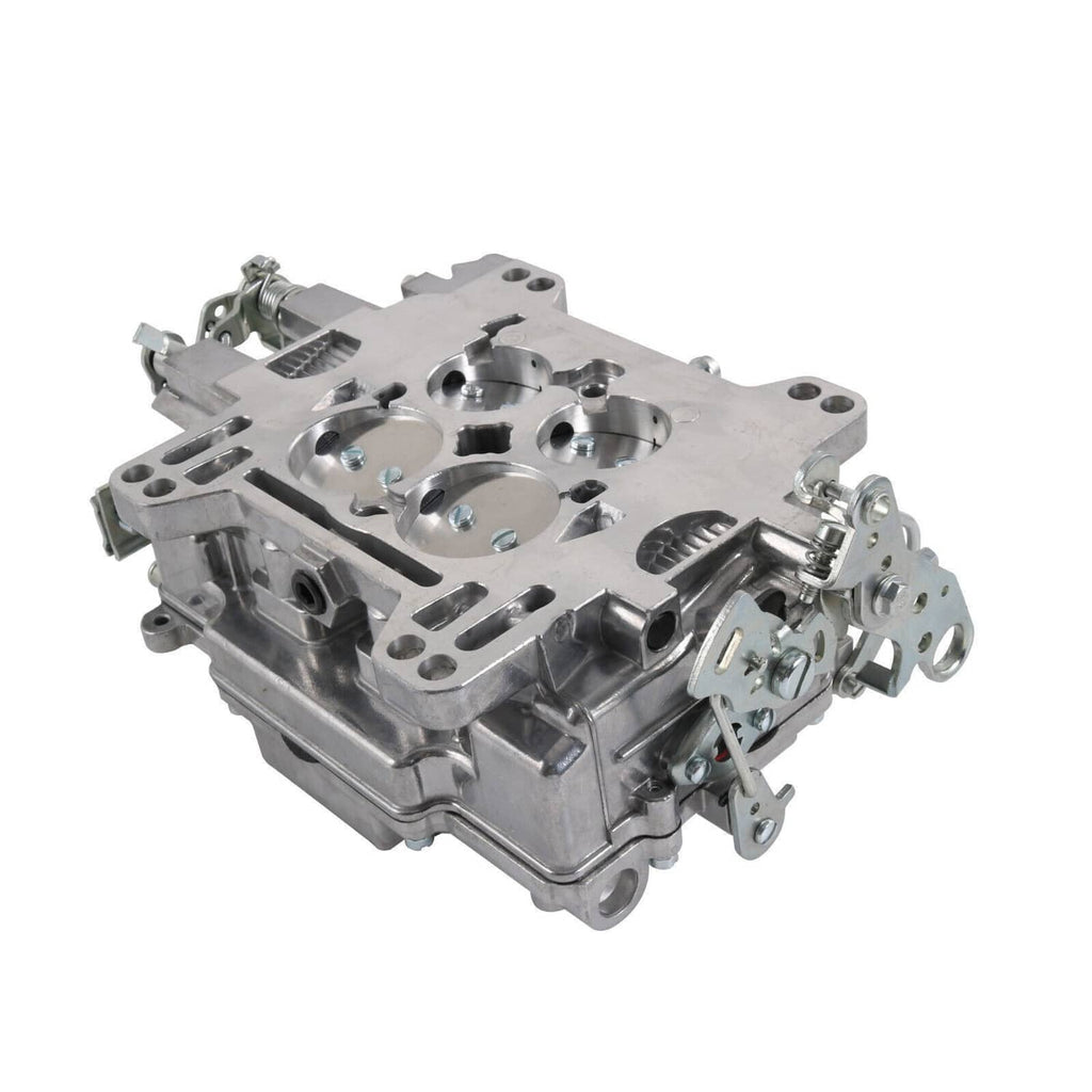 Four-barrel carburetor top/side view with round bores and machined passages