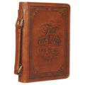 Brown vegan leather Bible cover with embossed Scripture design and front strap