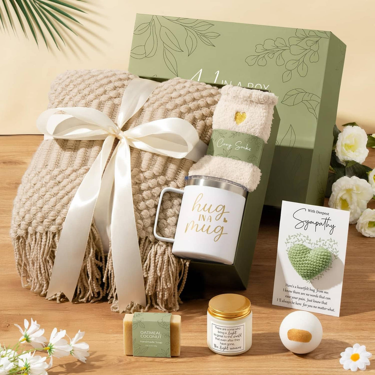 Sympathy gift basket with beige blanket, hug mug, scented candle, soap, and sympathy card