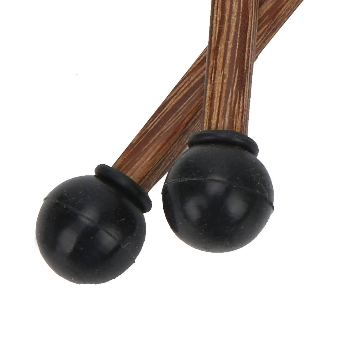 Close-up of tongue drum mallet with two black rubber heads and brown wooden handle
