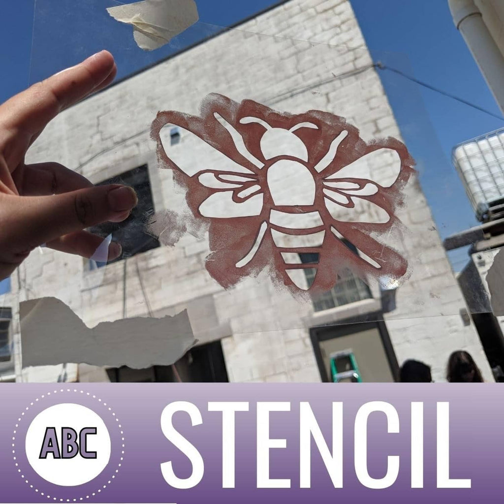Clear craft mylar film sheet for stencil projects, flower stencil cutout on glass