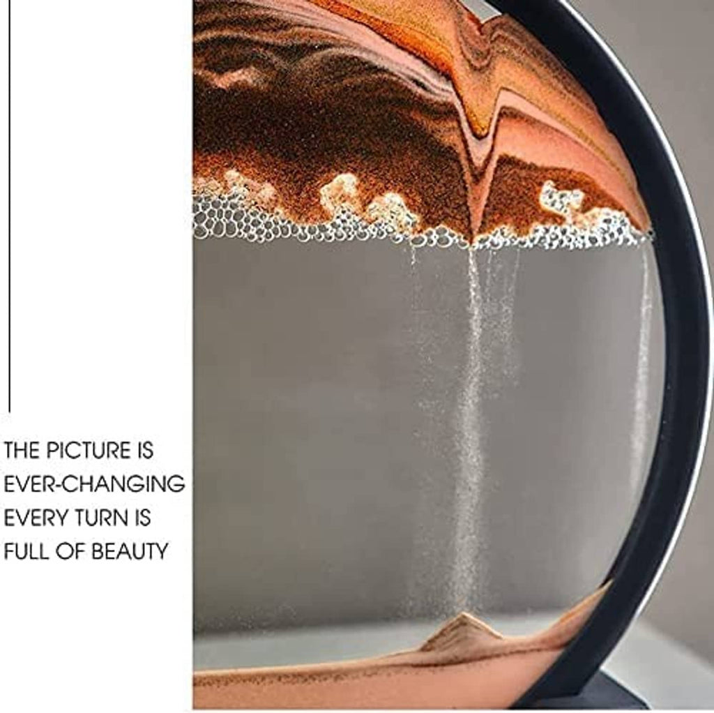 Dynamic sand art sphere close-up with black frame and cascading white sand line