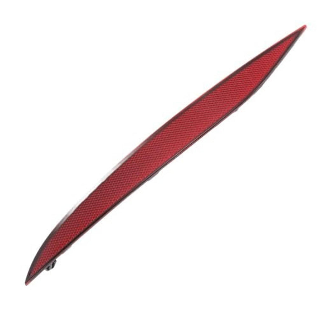 Red reflective bumper strip detail, pointed triangular ends and textured lens surface.
