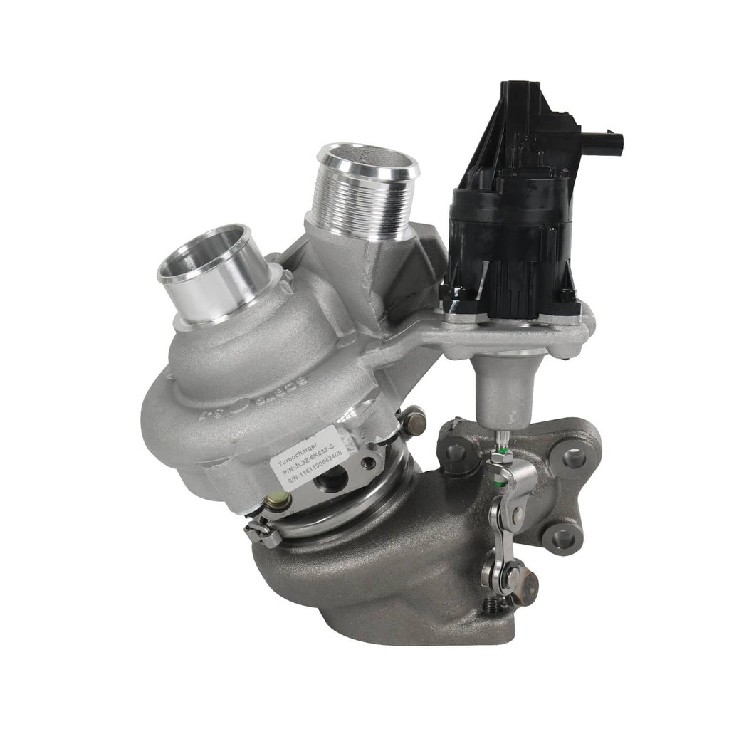 Turbocharger assembly with silver housing and black solenoid, side view