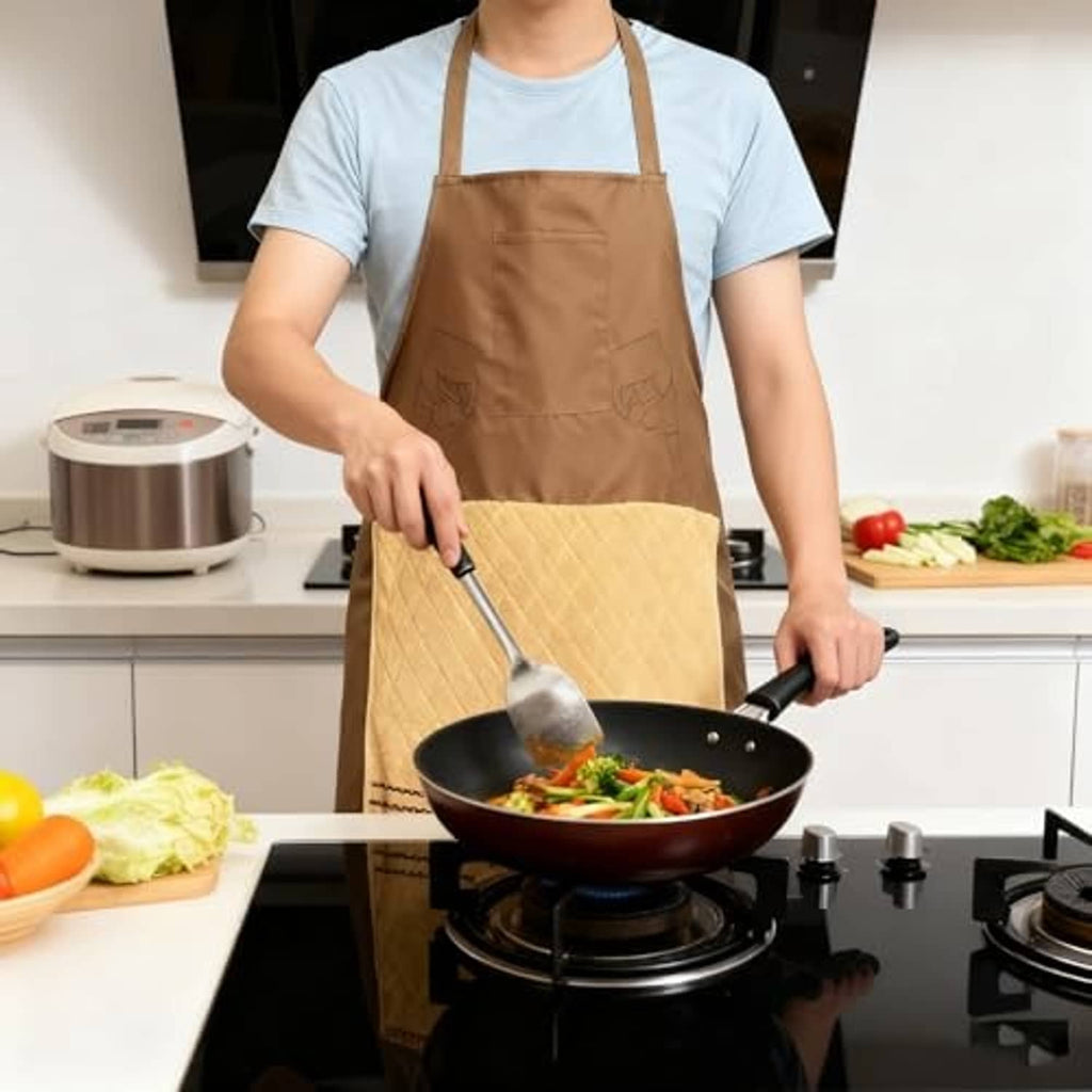 Brown apron with tan lower panel, front pocket, adjustable straps while cooking