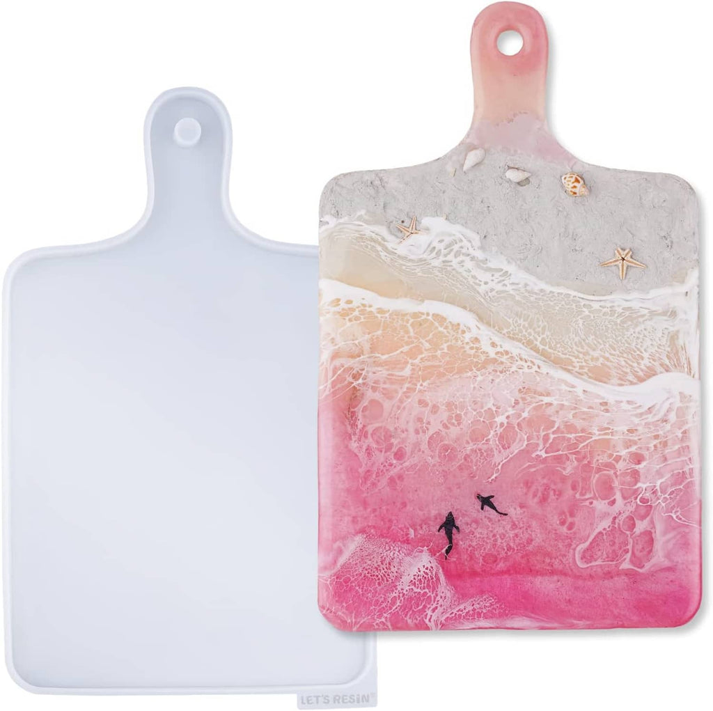 Rectangle silicone resin tray molds, pink handle mold in front of light blue mold