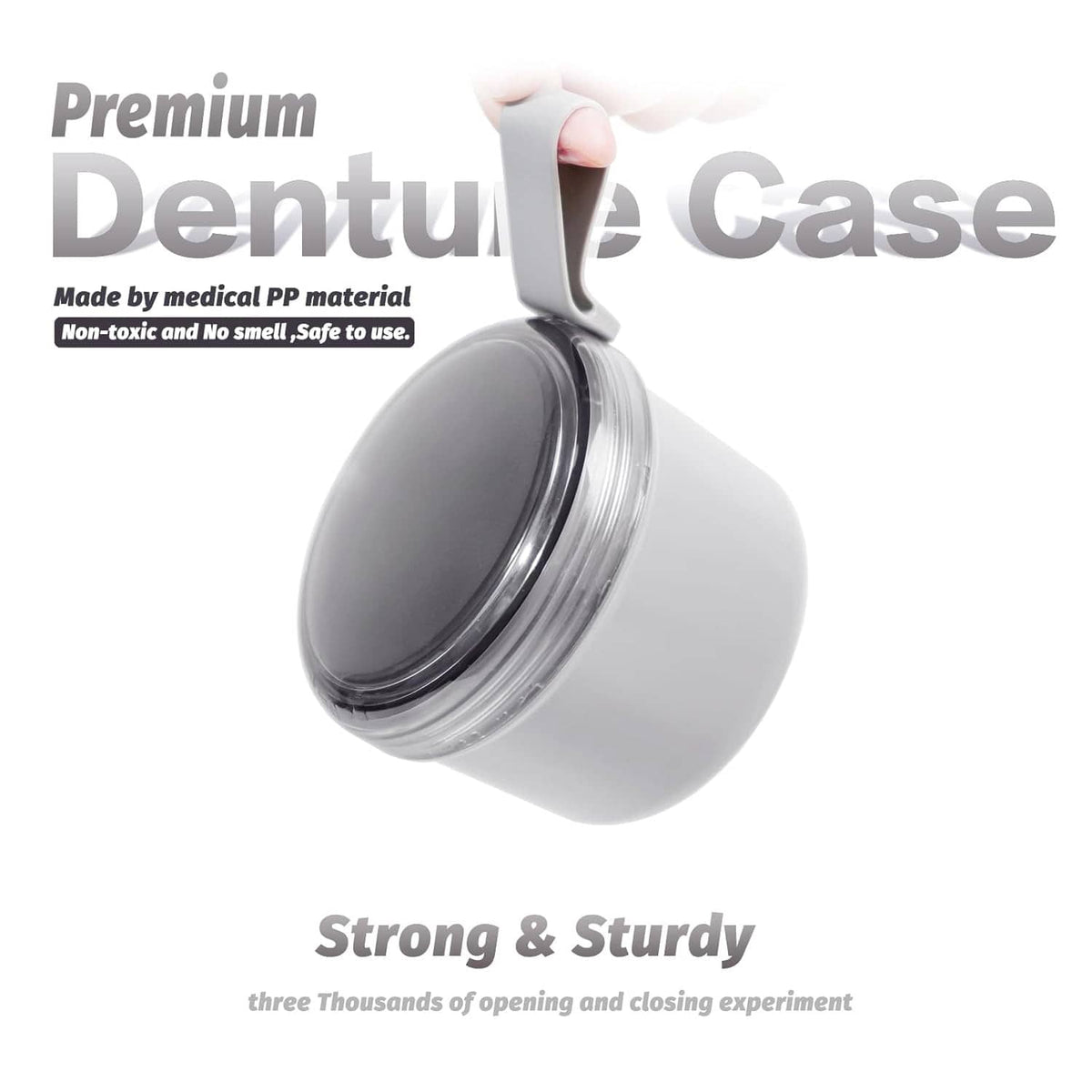 Gray denture soaking cup with black lid open, shown tilted.