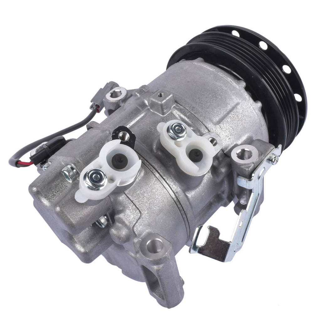 Silver A/C compressor with black pulley and electrical connectors, metal housing.