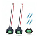 2 female headlight wiring harness connectors with red/black wires and green terminals