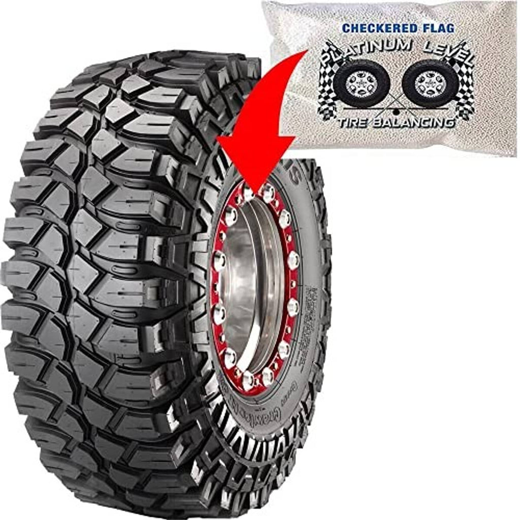 Truck tire beside a tire balancing bead pouch, with red arrow indicator