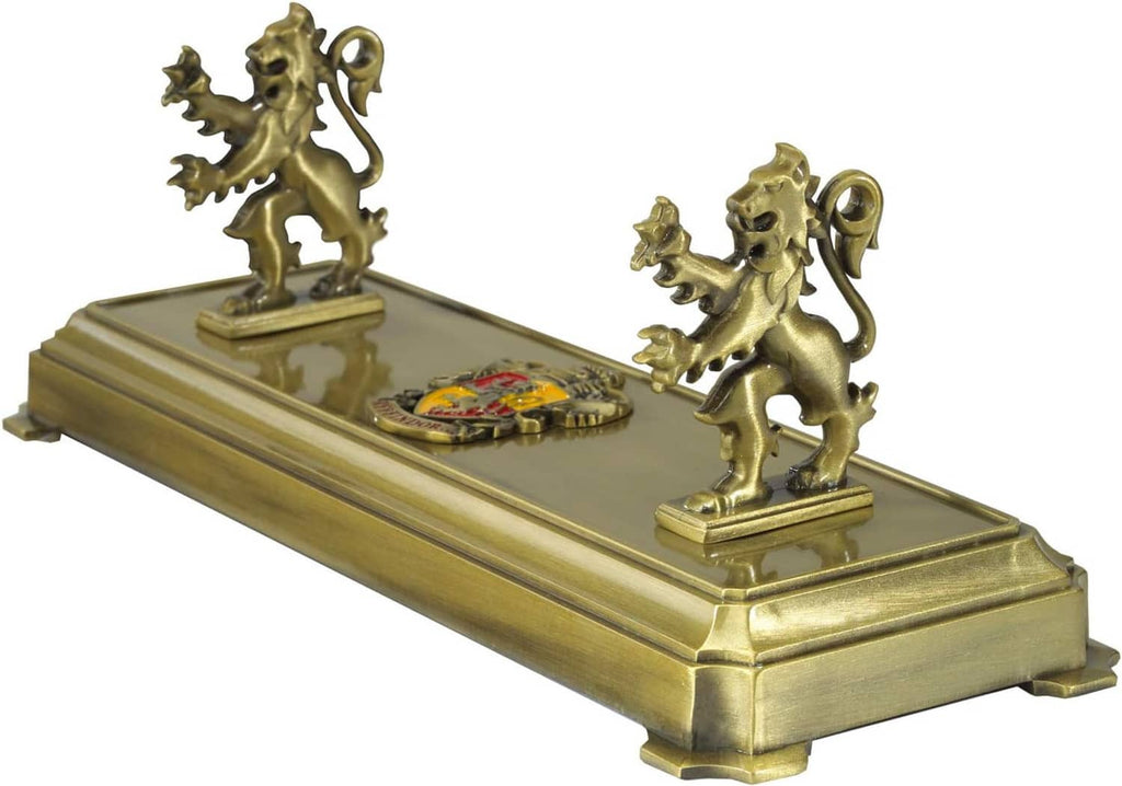 Gold Gryffindor wand stand with two gryphon figures on a rectangular base