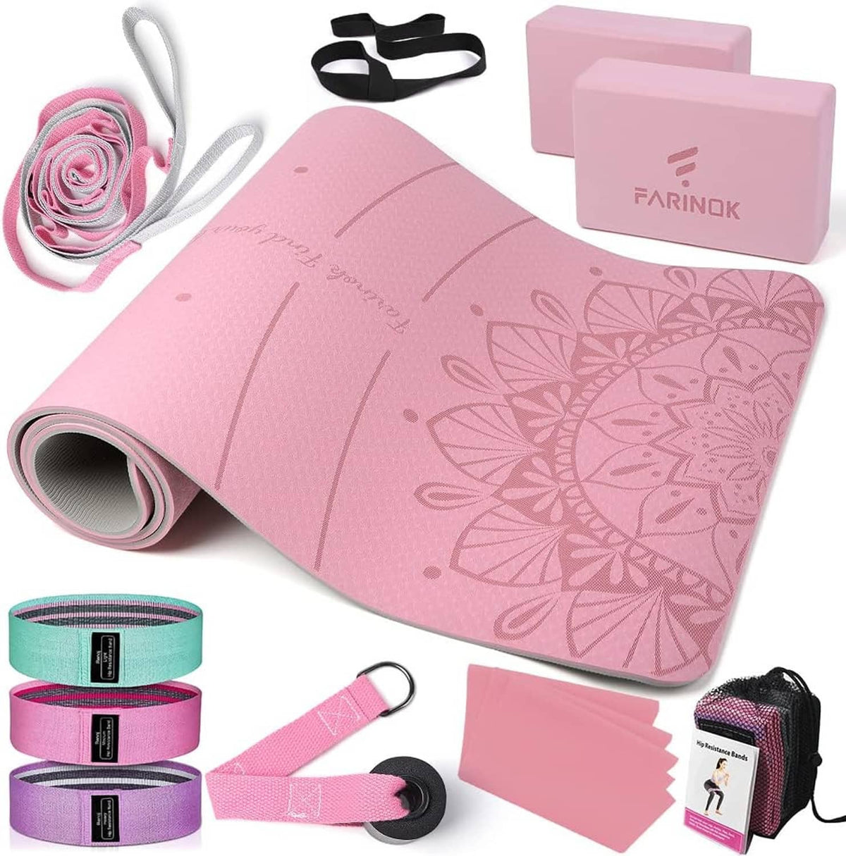 Pink yoga mat with mandala embossing, yoga blocks, resistance bands, and carrying straps