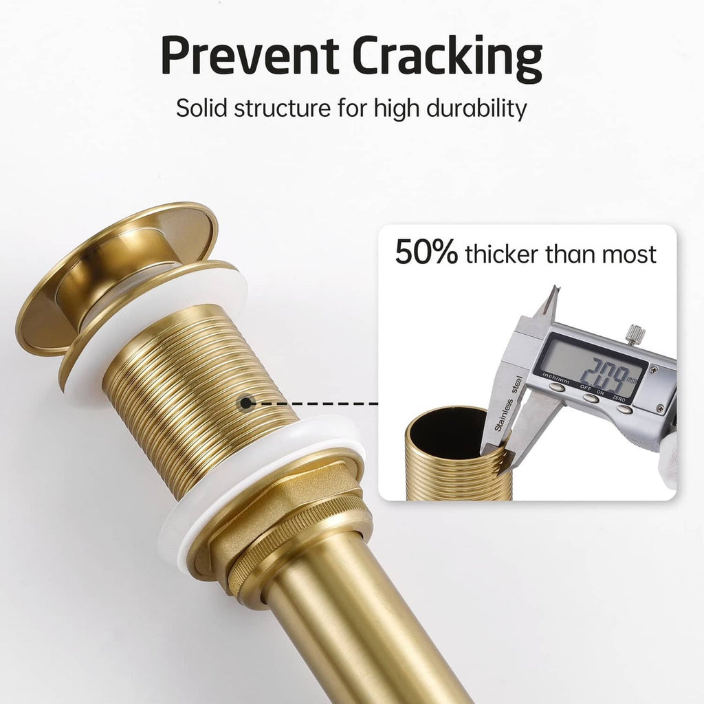 Brushed gold pop-up sink drain stopper close-up with thick threaded body