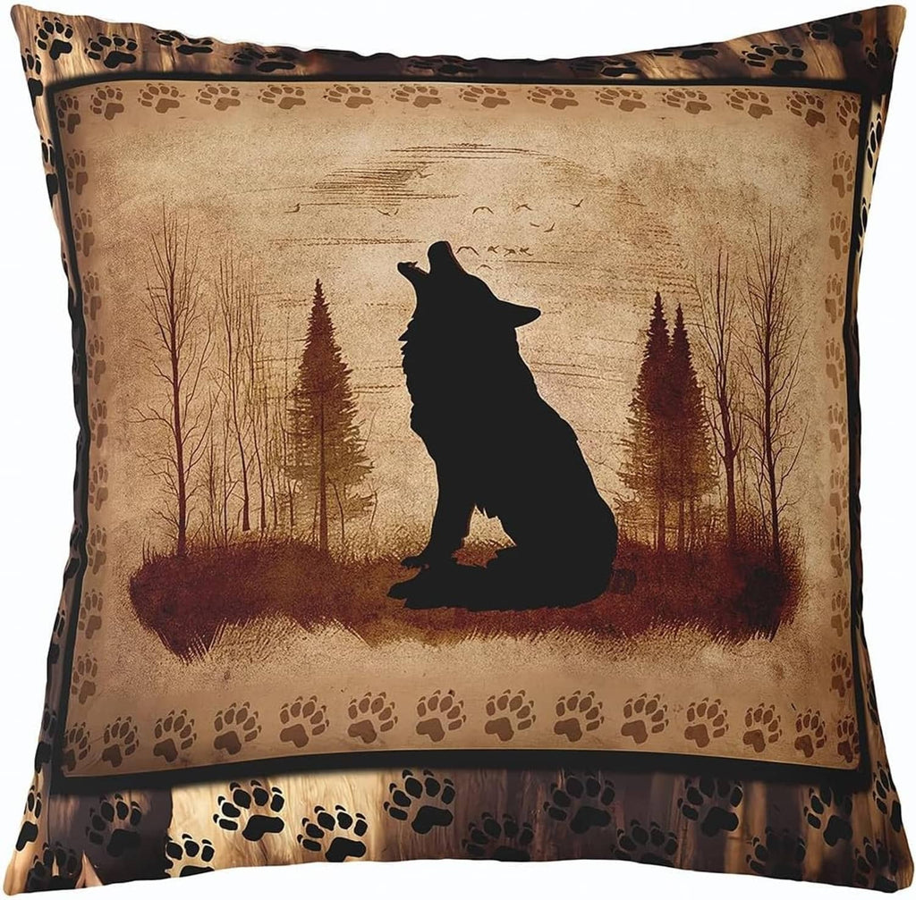 Tan throw pillow cover with black bear silhouette in woodland scene and paw print border