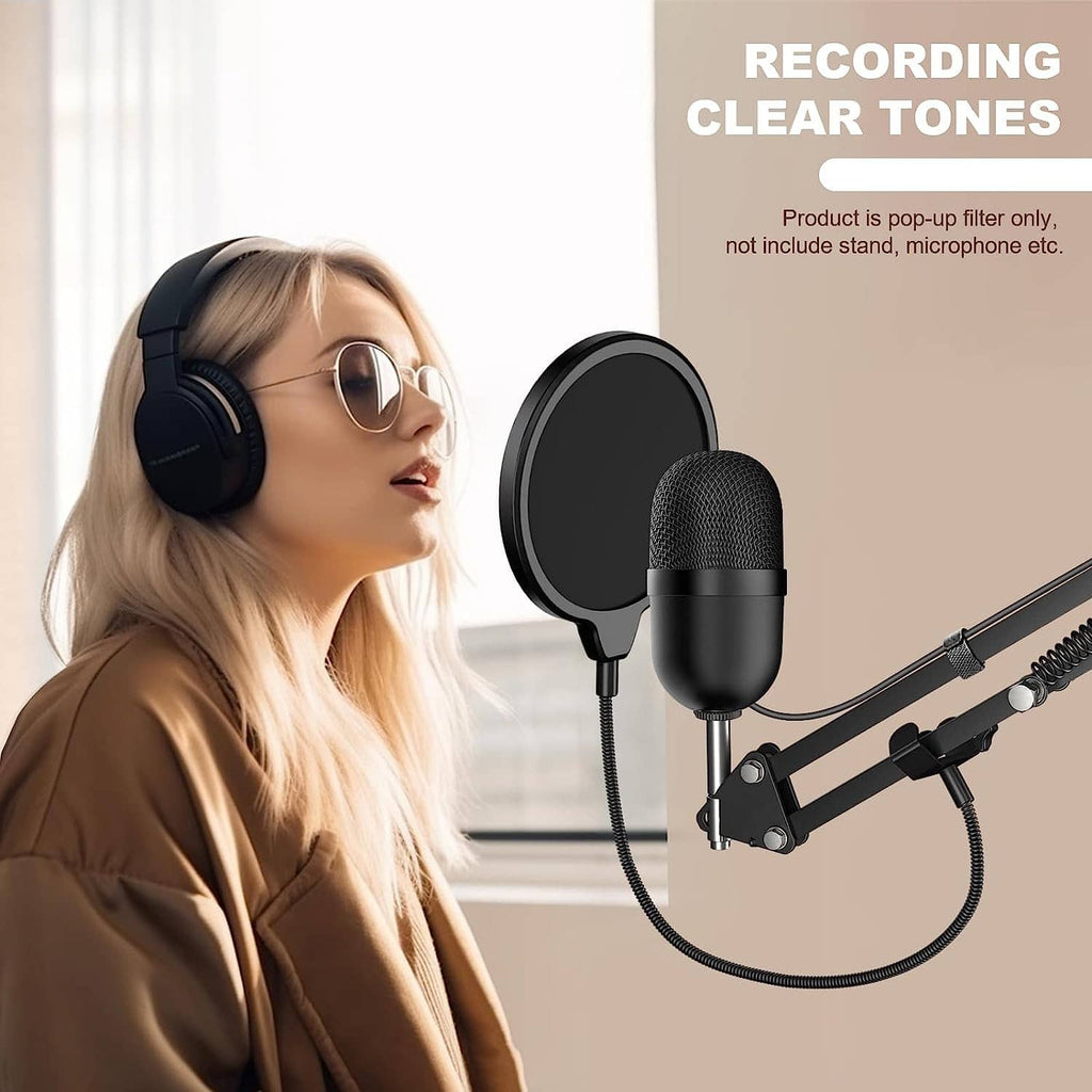 Black pop filter shield in front of a condenser microphone on a boom arm