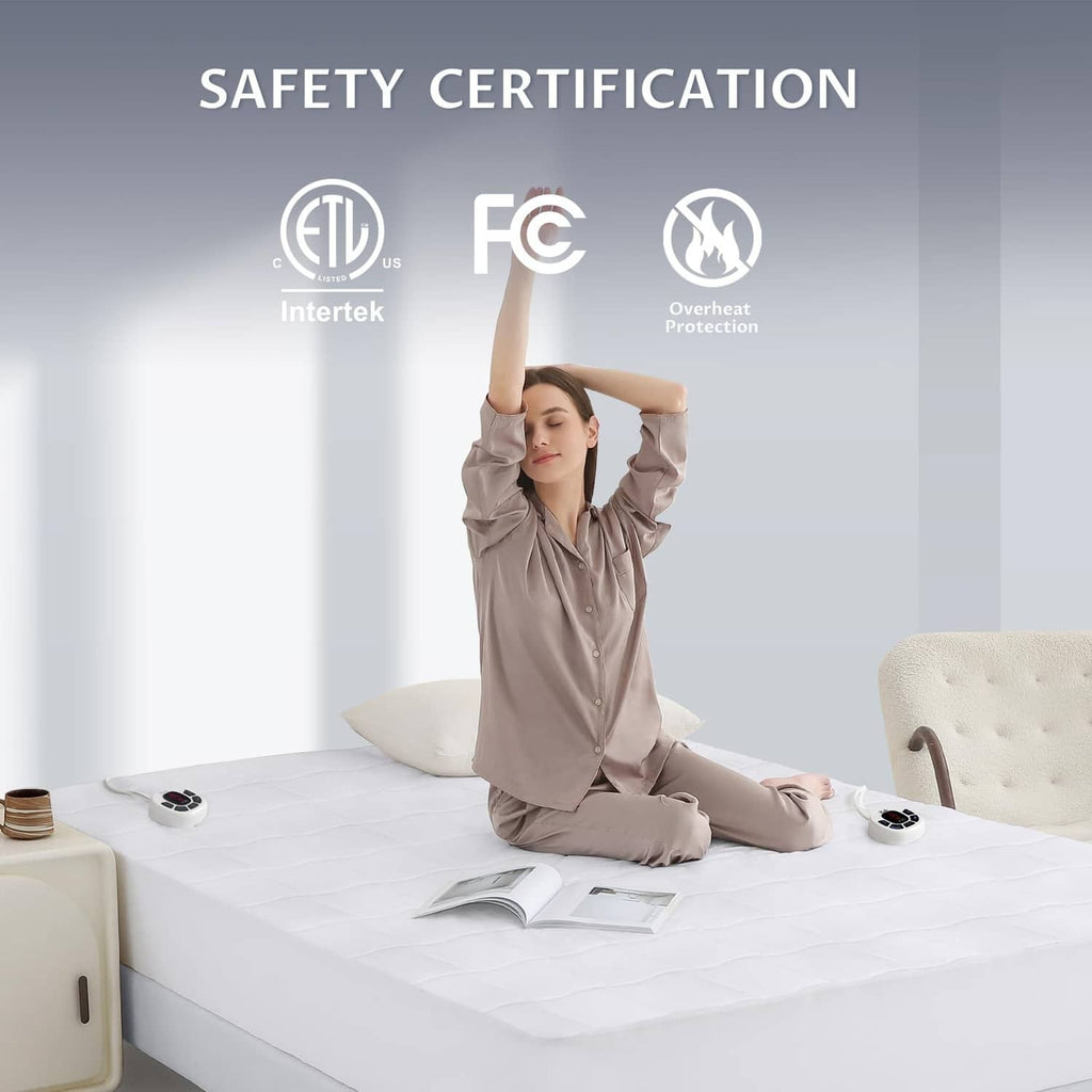 White heated mattress pad with safety certification icons and overheat protection