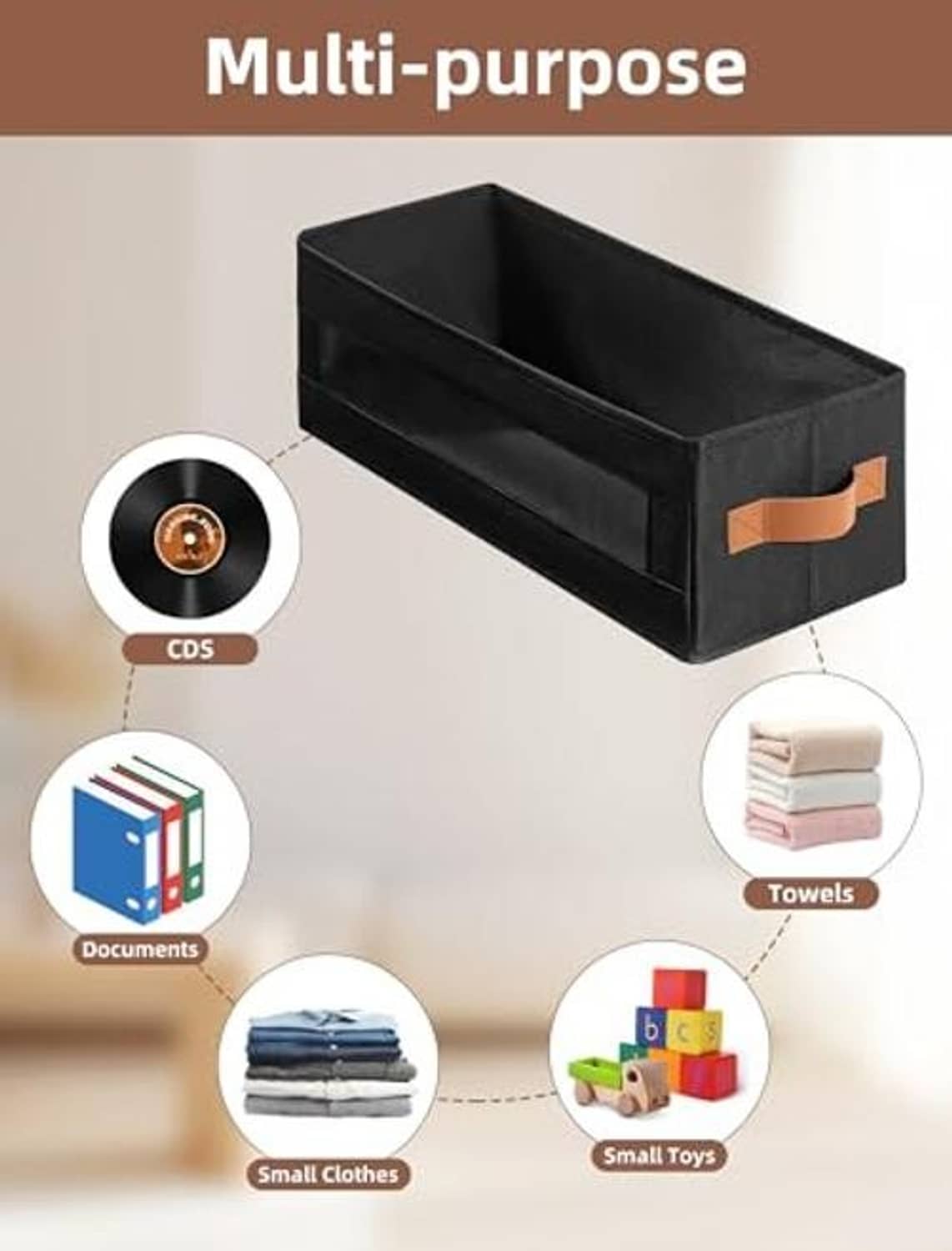 Black multi-purpose storage bin with orange handle straps and open interior
