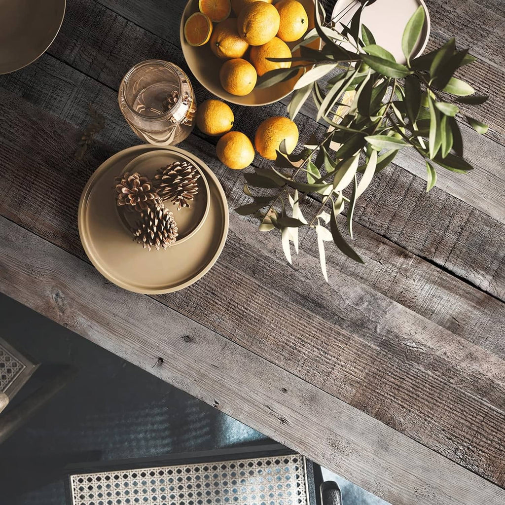 Gray shiplap wood-plank peel-and-stick wallpaper sheet with decorative items