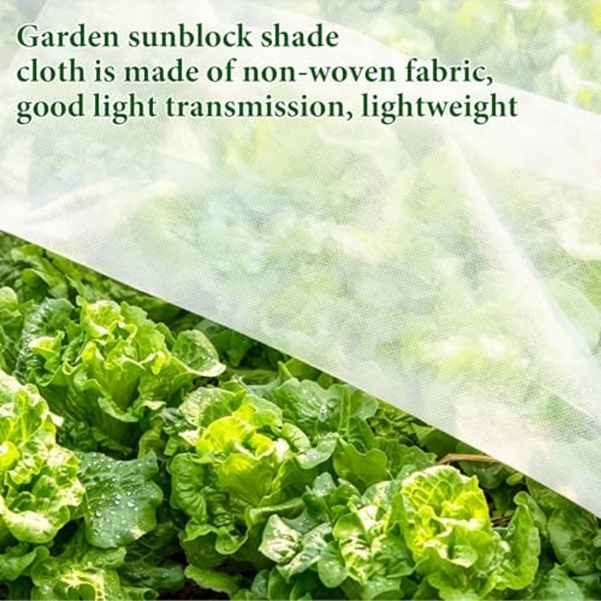 White breathable shade cloth laid over green plants, showing lightweight translucent fabric.