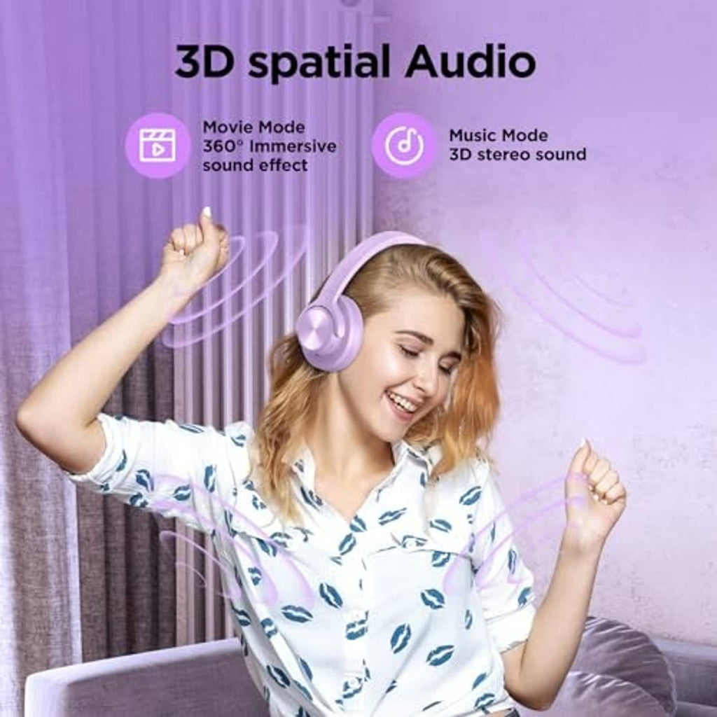 Purple over-ear wireless headphones being worn by a smiling person