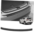 Matte black rear bumper protector strip with raised tread pattern for car bumper