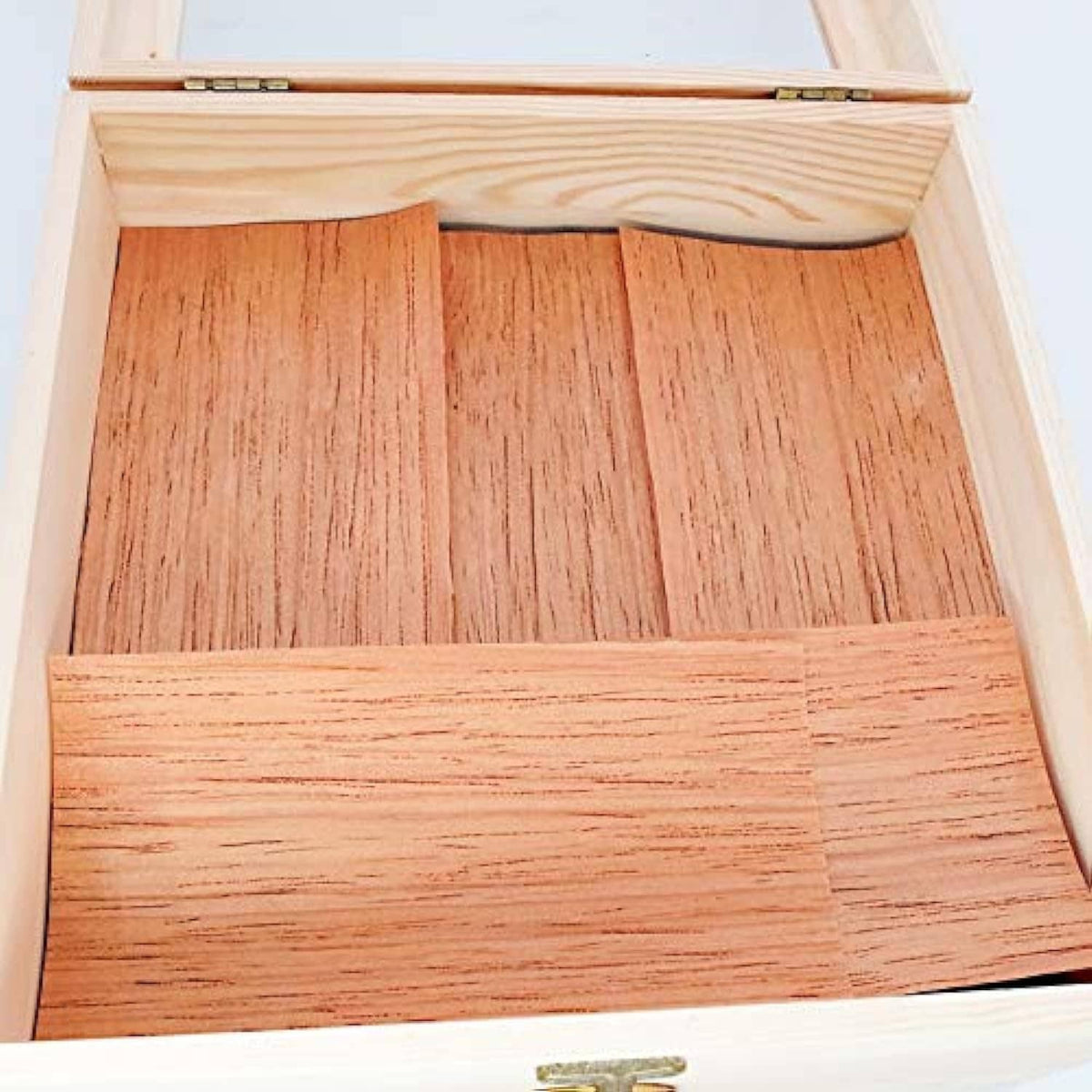 Spanish cedar humidor lining with vertical wood panels in an open box