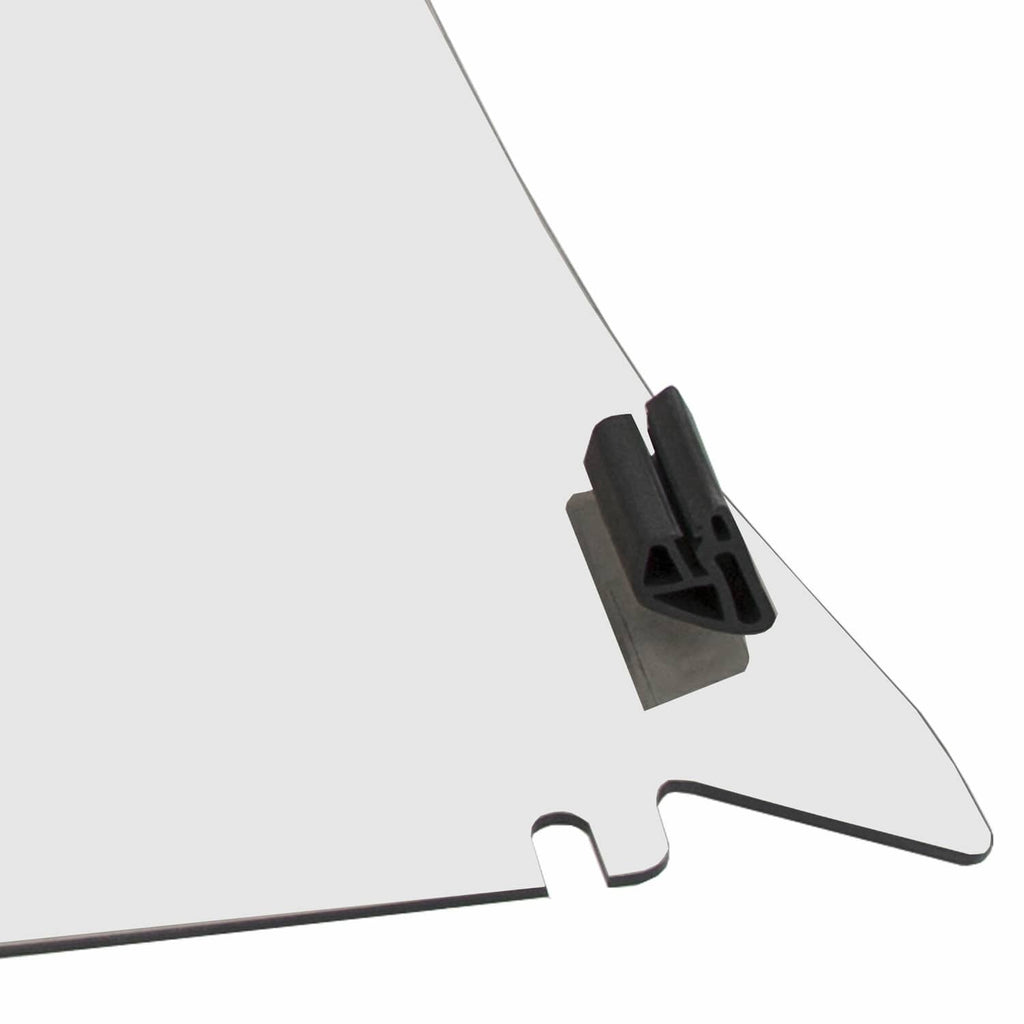 Close-up of windshield clip bracket on clear panel with blue frame edge.