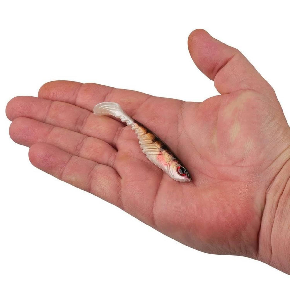 Berkley PowerBait swimbait lure in palm, light perch color with red eye