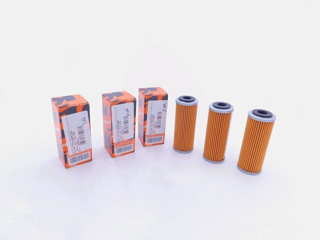 KTM oil filter set: three orange pleated cartridges plus three orange boxes