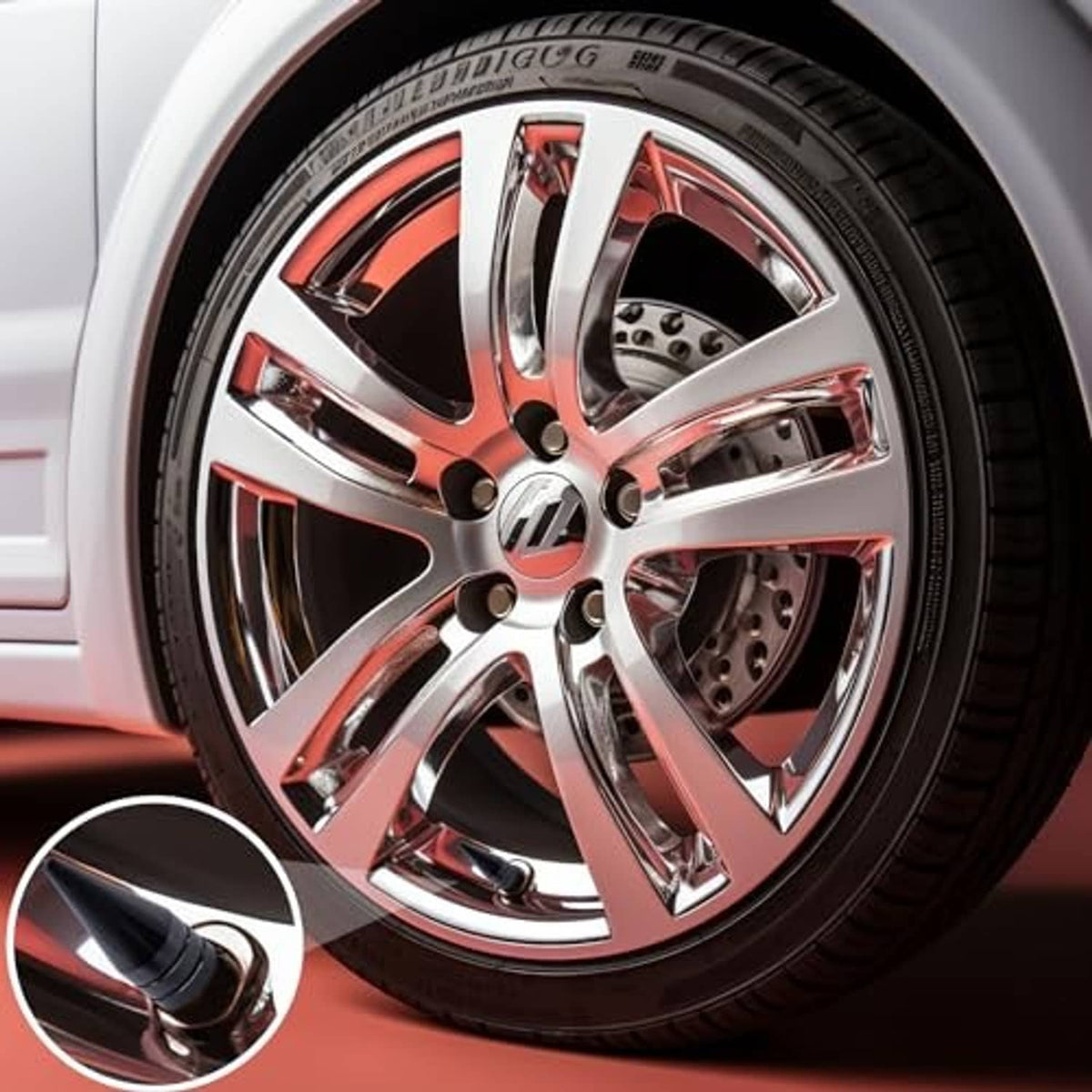 Black spiked tire valve stem caps shown on a car wheel