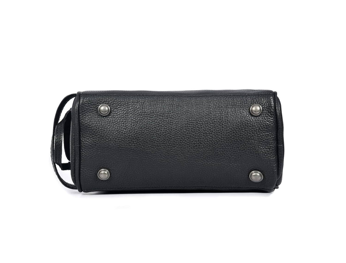 Black leather hanging toiletry pouch with metal grommets and side strap