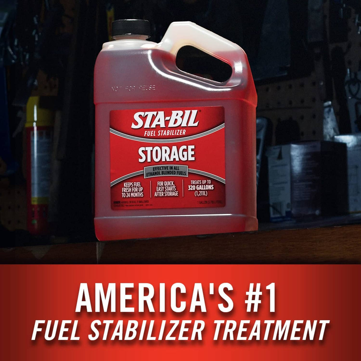 Red fuel stabilizer jug with front label and white spout handle on floor