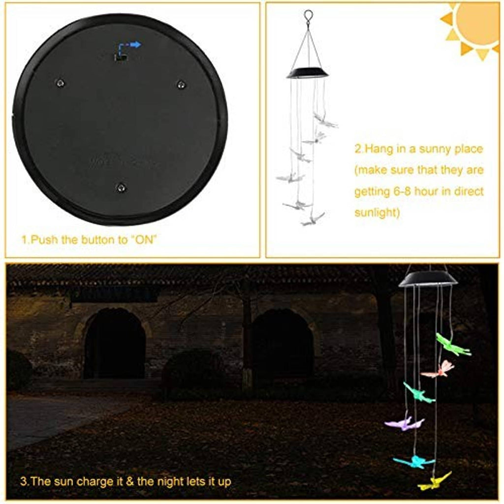 Solar-powered butterfly wind chime with black panel base and hanging chimes