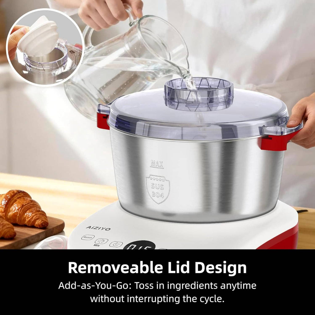 Dough mixer with removable clear lid opened, stainless bowl and red handle accents