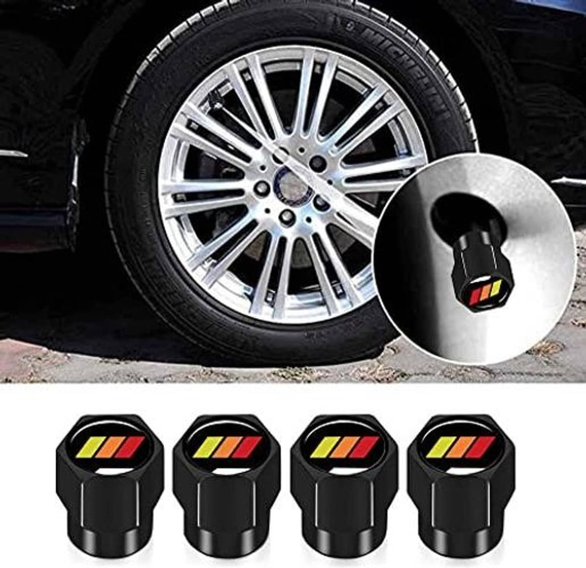 4-pack black valve stem caps with tricolor emblem shown near alloy wheel