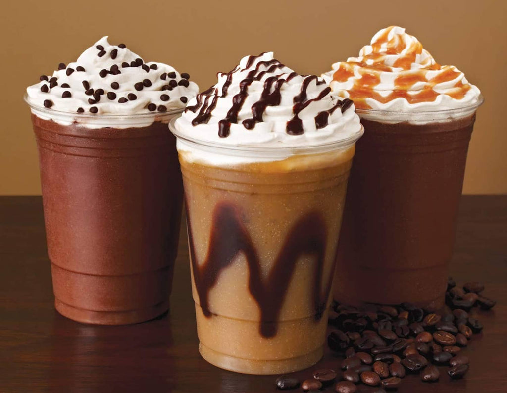 DaVinci Irish cream syrup milkshake cups with whipped cream and drizzles