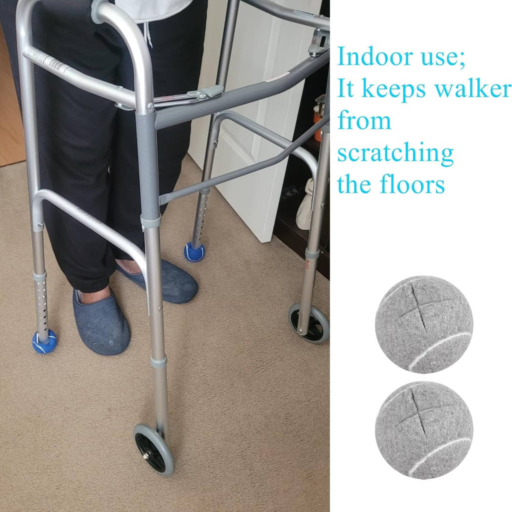Grey felt ski glide pads, close-up on walker feet over carpet