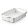 White ceramic 9x13 lasagna baking dish, rectangular with ribbed sides and side handles.