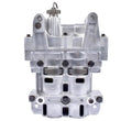 Oil pump balance shaft housing, silver metal with mounting ears and port openings.