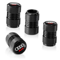 Black knurled tire valve stem cap set with Audi logo, ridged metal-look top