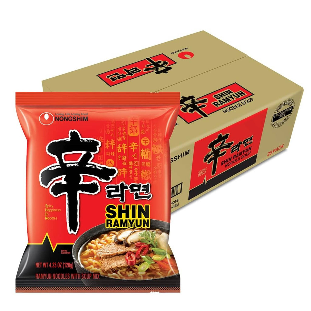 Spicy ramen noodle pack with red Nongshim Shin Ramyun packet and brown carton