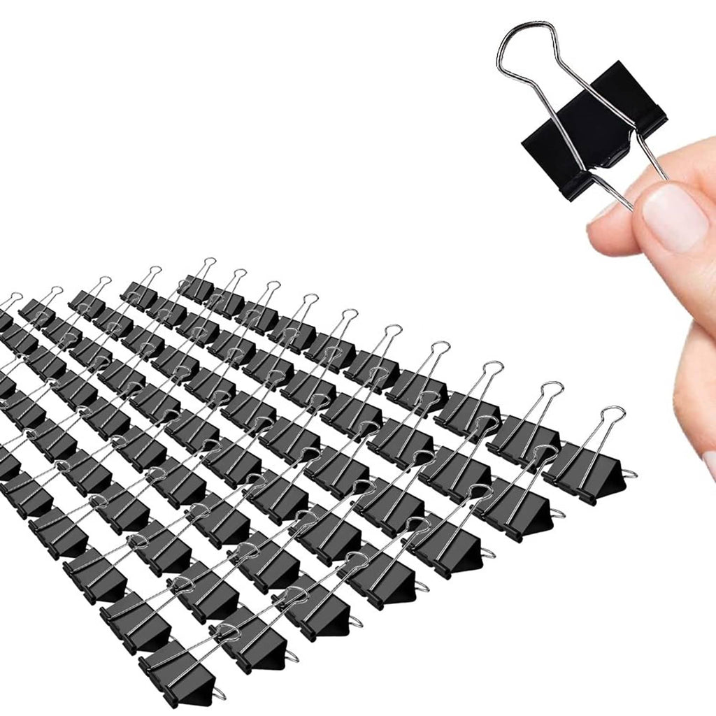 Black 1-inch binder clips with silver metal handles, held in hand
