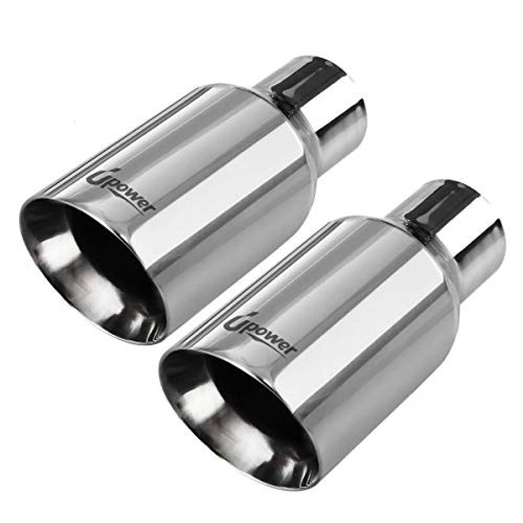 Two mirror-polished stainless exhaust tips with black inner outlet ends, angled view