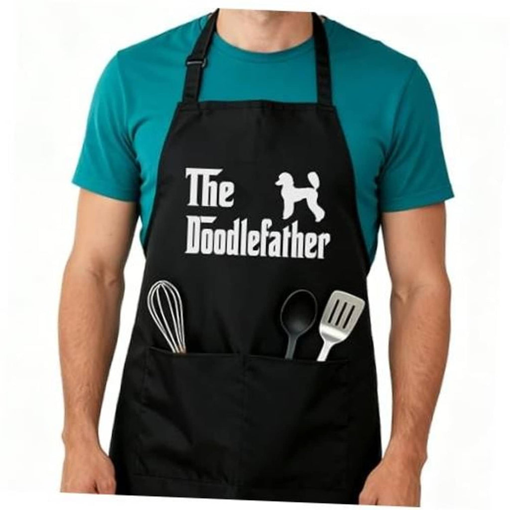 Black adjustable apron with “The Doodlefather” print and utensil icons on front pocket panel