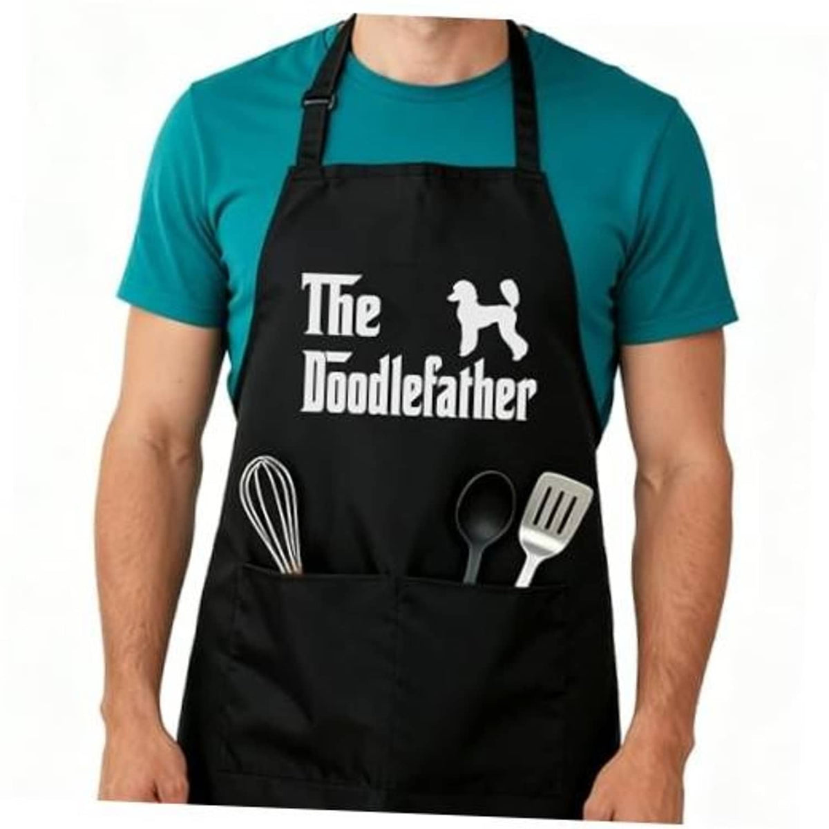 Black adjustable apron with “The Doodlefather” print and utensil icons on front pocket panel