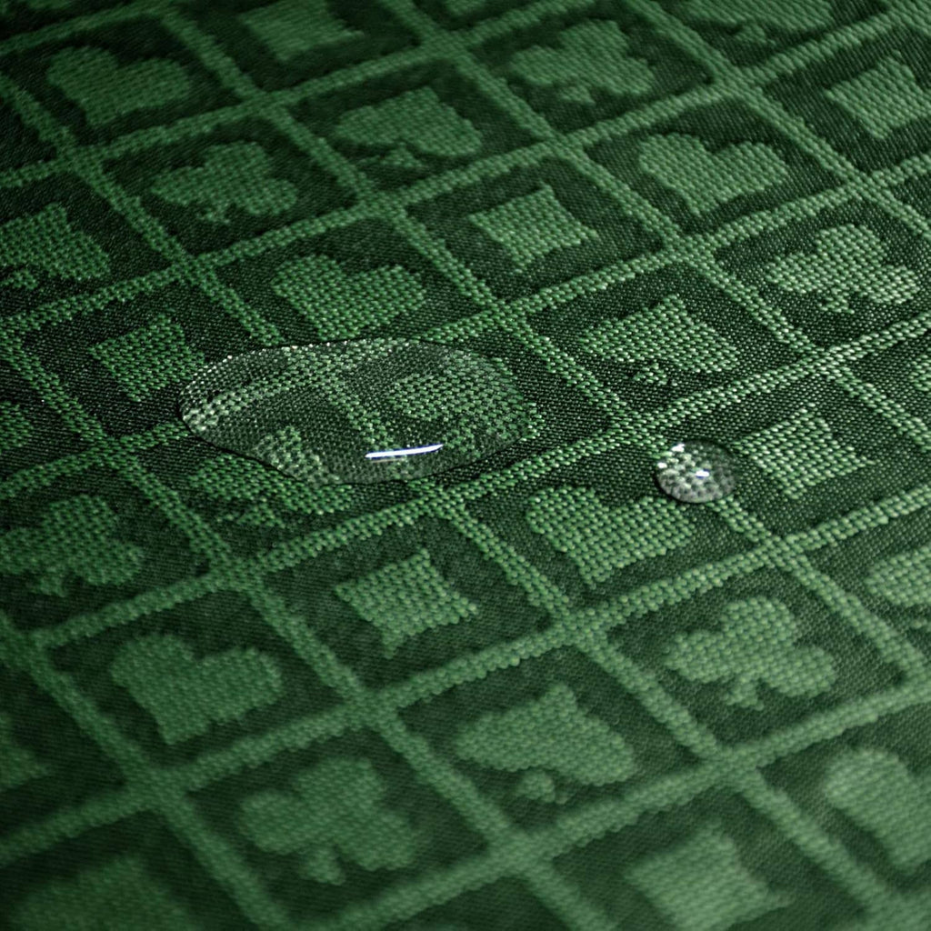 Green poker table speed cloth surface with small stitched detail and diamond pattern