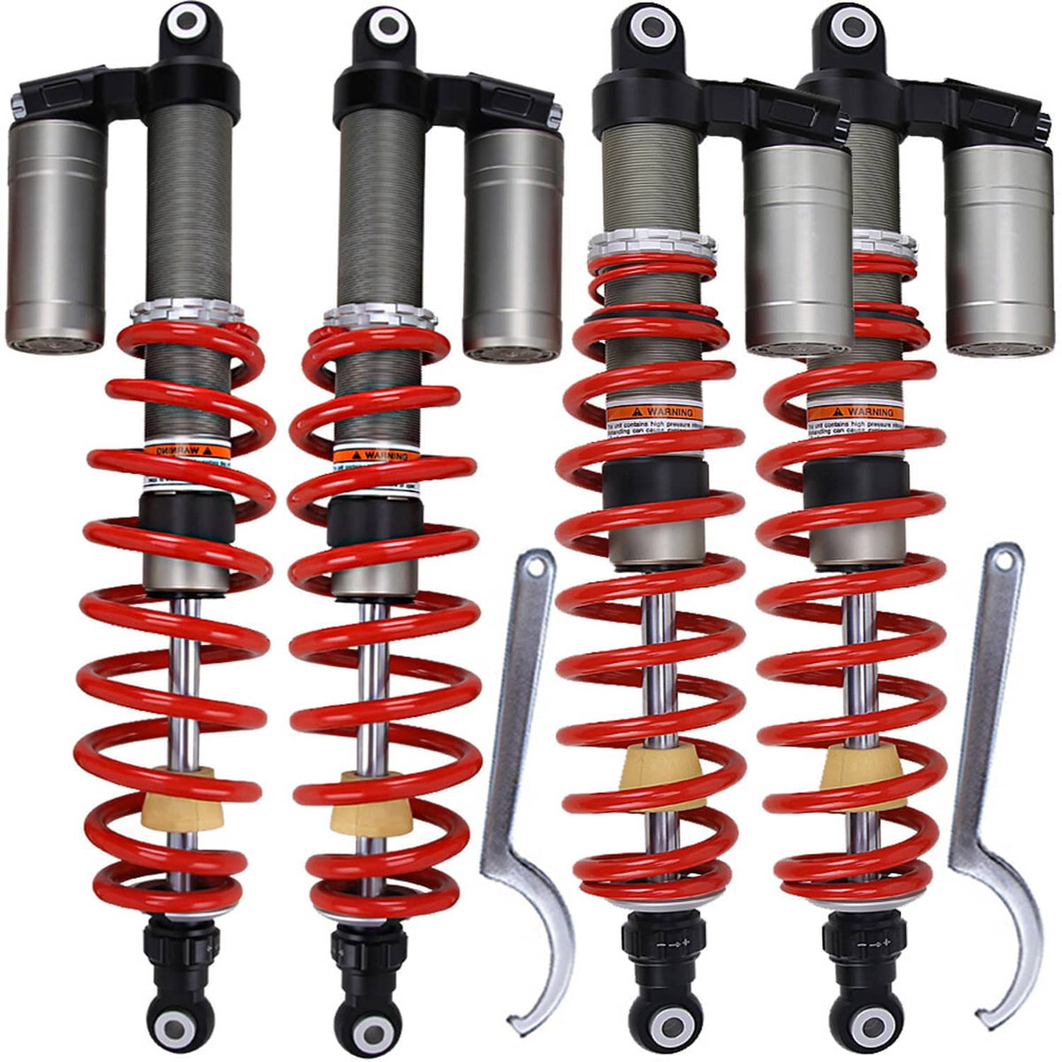 Four shocks absorbers with red coil springs, silver bodies, and black top mounts
