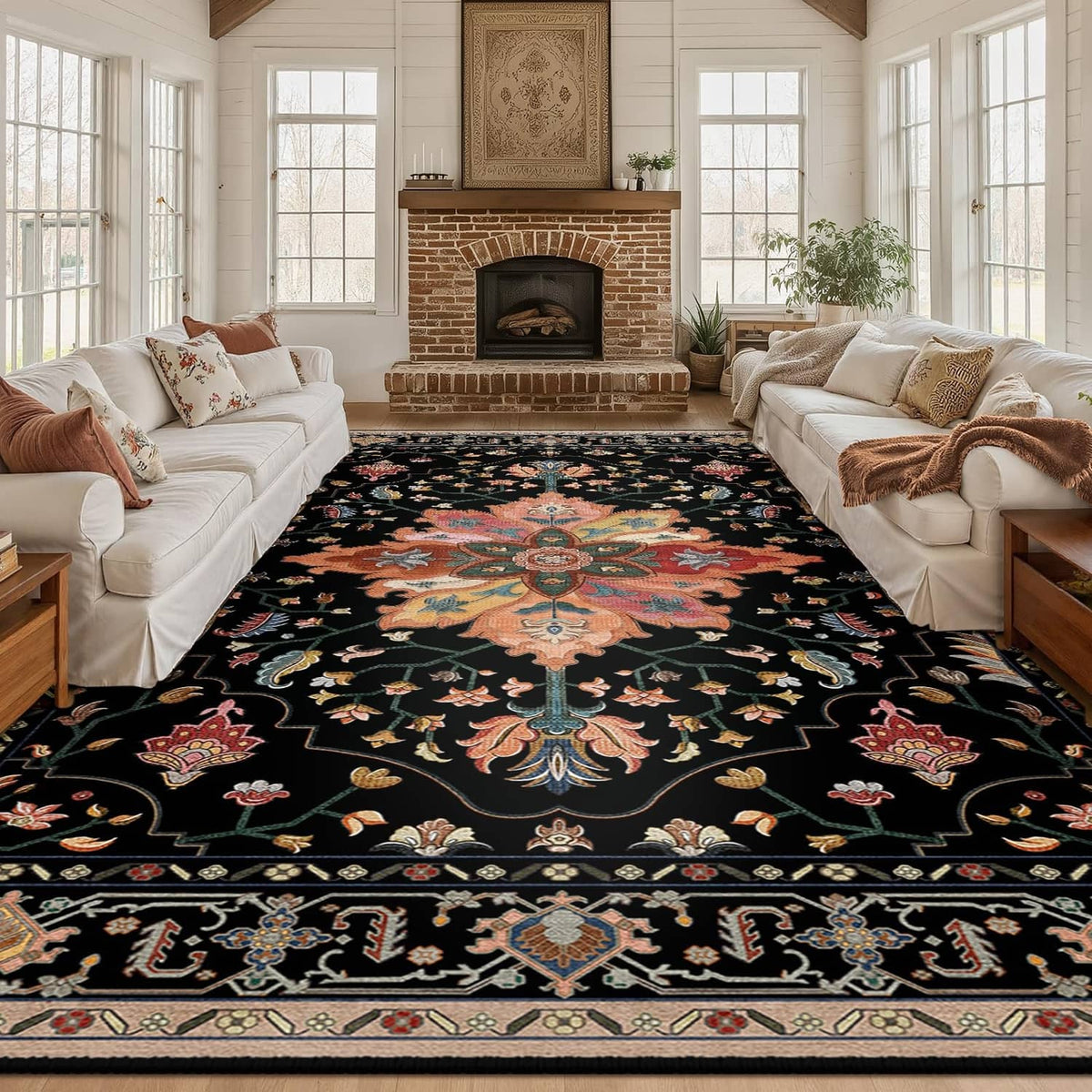 Large rectangular area rug in black with multicolor floral and ornamental medallion pattern